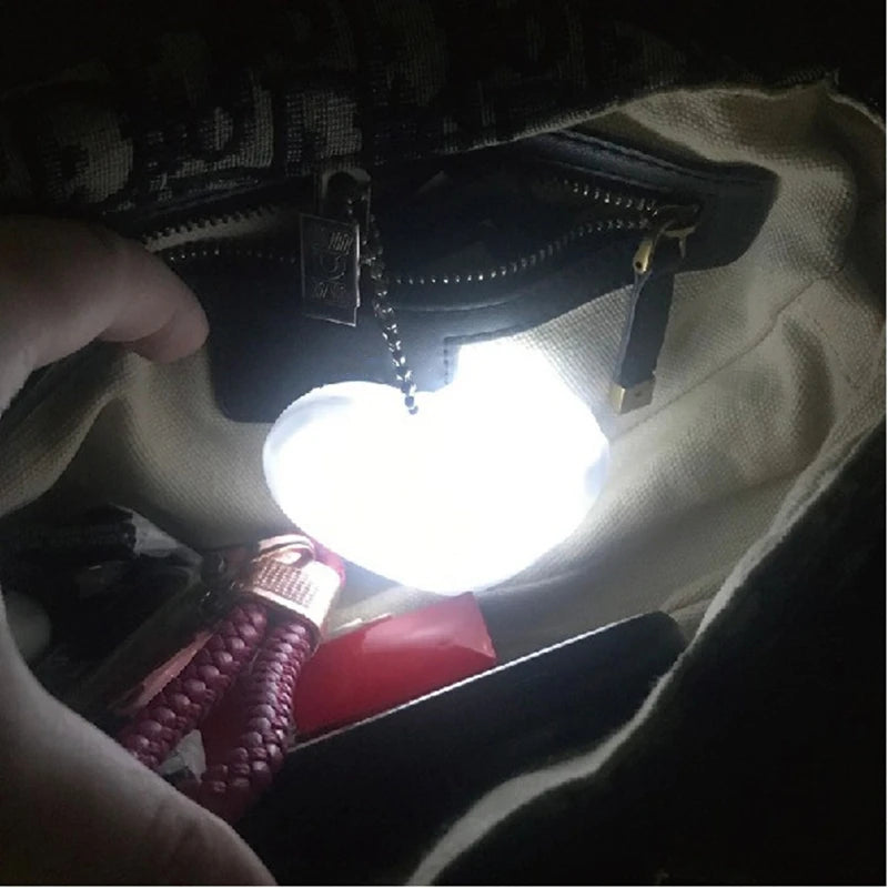 GlamLight™ – Ilumine Seu Estilo com a Luz de Bolsa com Sensor de Toque!